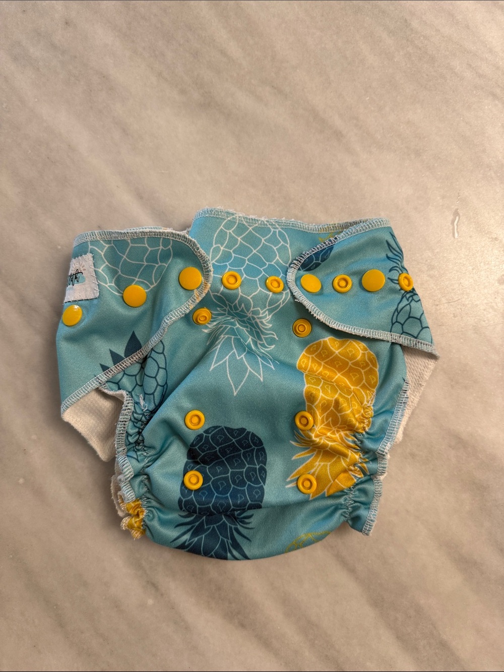 Reusable Pineapple Print Diaper Cover in Teal with Yellow Snaps